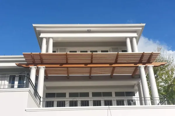 Pergola on a white house