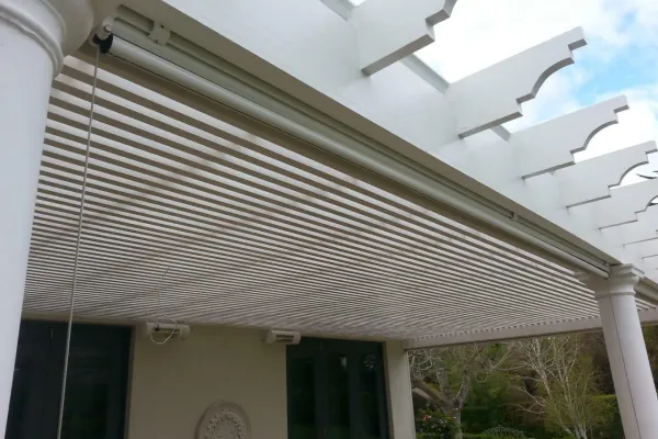 Pergola next to pool