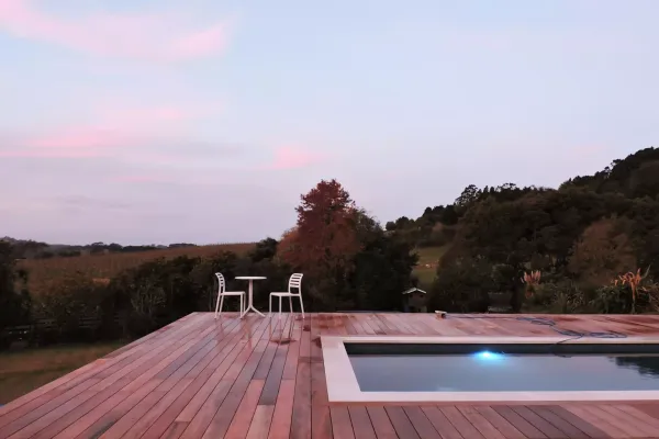A deck built around a pool in Auckland. Showing the fine craftsmanship