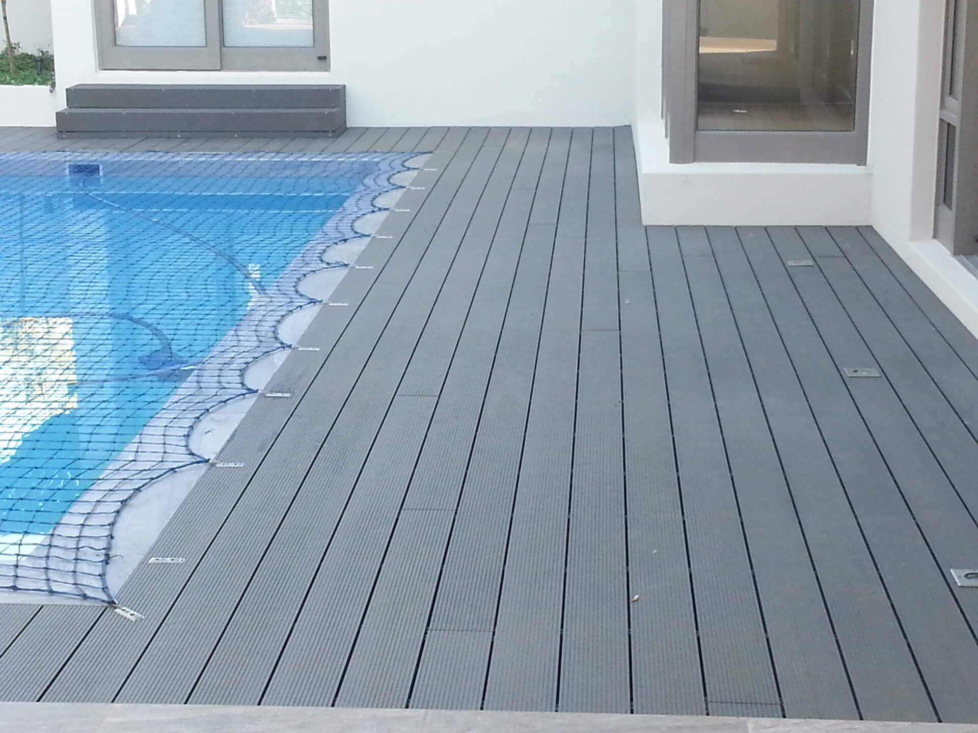 Composite deck pool surround
