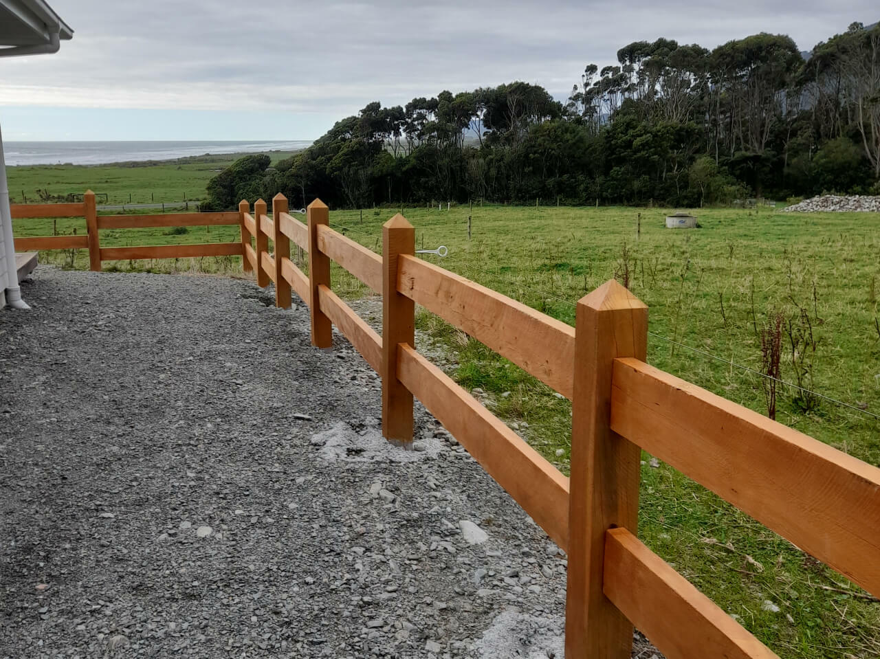 Timber fence to separated road