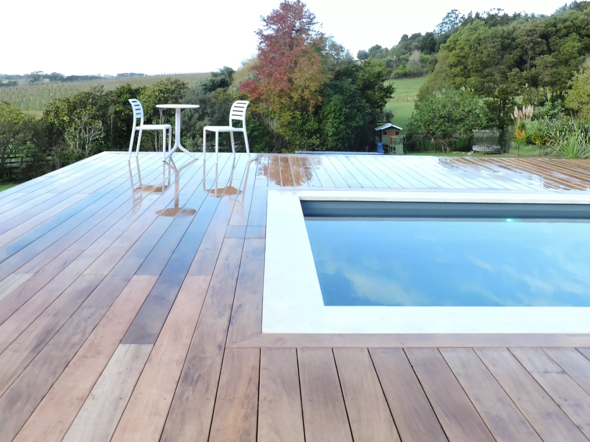 A deck built around a pool in Auckland. Showing the fine craftsmanship