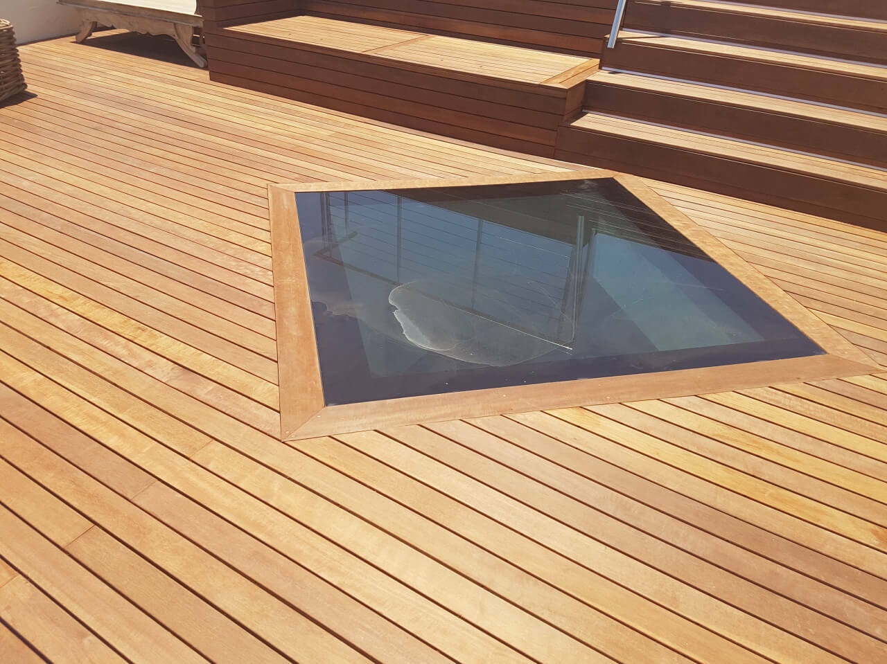 Timber deck with glass window integrated
